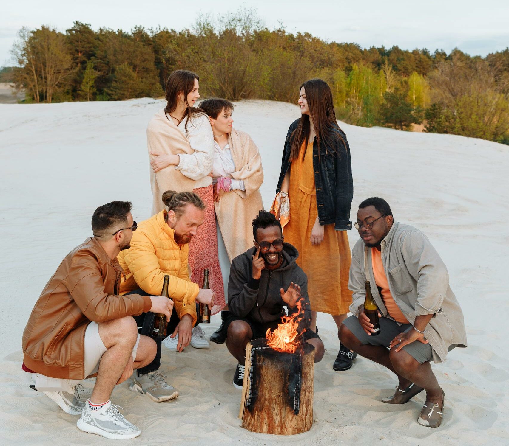 Group of Friends Having a Bonfire on the Beach